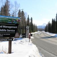 Office sign outside of Anchorage District and Field Office in the winter