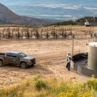 pick up truck and oil and gas well pad