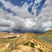 Grand Staircase-Escalante National Monument with mountains and clouds rolling in. 