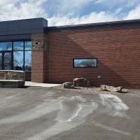 building exterior of brick with glass windows