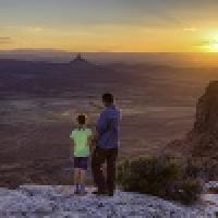 Father and daughter watch the sunset in Utah, thumbnail