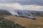 Aerial photo of Alkali Ridge Fire burning in field