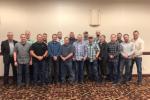 A group photo of the 18 men and women BLM Field Training Officers standing shoulder to shoulder
