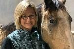 Laura Newberry and her first mustang Buckeye Boone