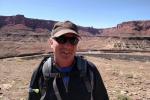 Kirk Halford hiking to ancient ruins in Canyonlands National Park
