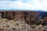 Jim Irwin (right) and Dave Scott examine the interior of the Río Grande Gorge from the west rim during their training March 11–12, 1971. Photo by NASA.