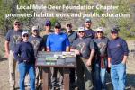 Mule Deer Foundation volunteers around interpretive sign