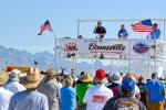 Audiences listening to announcers during SpeedWeek at the Bonneville Salt Flats, Aug 2023.