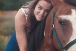 Jill Herold's high school senior picture with Guardian, her American mustang. 