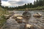 rocks sticking up from the river
