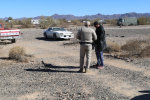 A Ranger is talking to a man. 