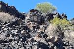 a rocky hillside in a desert landscape
