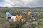 BLM WY staff and WY Conservation Corp crew pose for a photo during the restoration project at Muddy Creek in WY.
