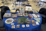 Table displaying various brochures, educational materials, and promotional items related to wildlife, geology, and public lands management.