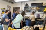 People look around inside a lab