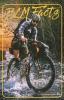 mountain biker riding through a stream