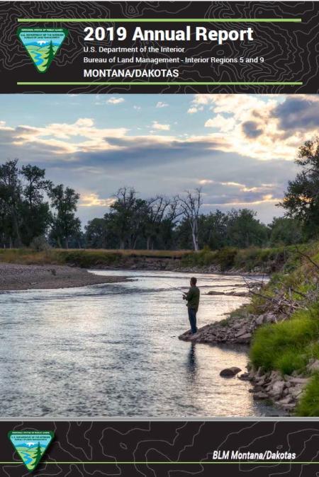 Annual report cover. Man fishing by in a river.