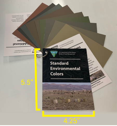 BLM Standard Environmental Color Tool laying on a surface with colors fanned out and with the dimensions 5.5”h x 4.25”w written on the photo for the Color Tool’s cover
