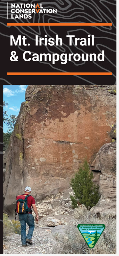 Brochure featuring photo of a hiker in a rocky canyon