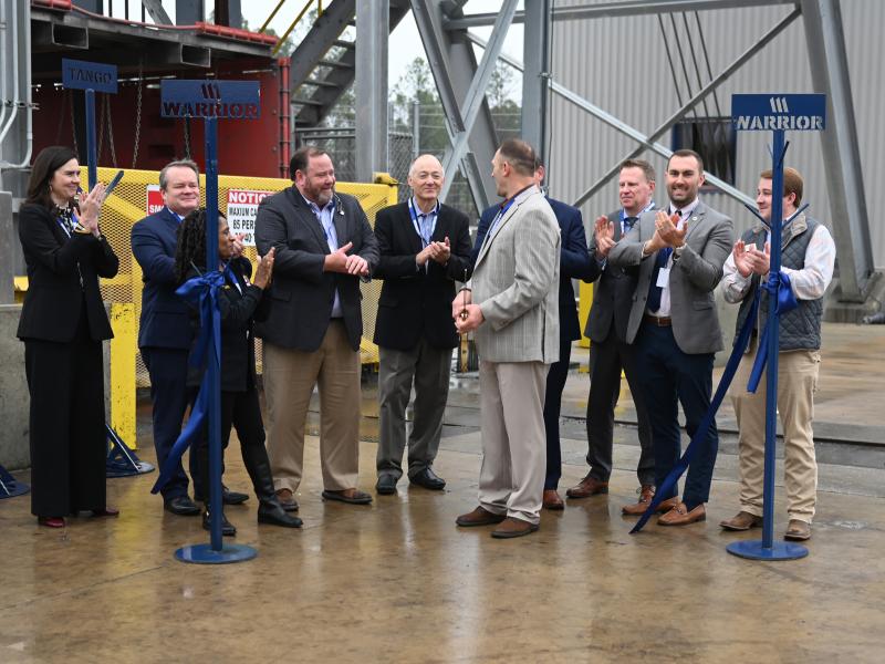 (back row, third from right) Bureau of Land Management Acting Director Bill Groffy, DOI Senior Advisor Ryan Hofmann along with Alabama state and local officials and industry partners celebrating the expansion. (Photo by D’Andre Wright, Warrior Met Coal, Inc.)