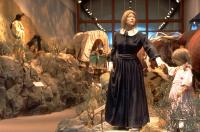 Diorama of Oregon Trail pioneer woman gazing into distance